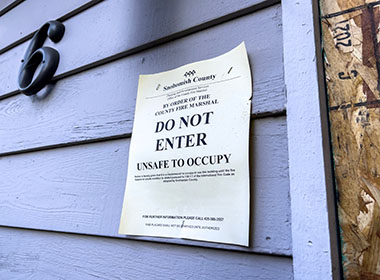 seattle-wa-usa-circa-november-2022-close-up-view-of-an-unsafe-to-occupy-sign-on-a-condemned-building